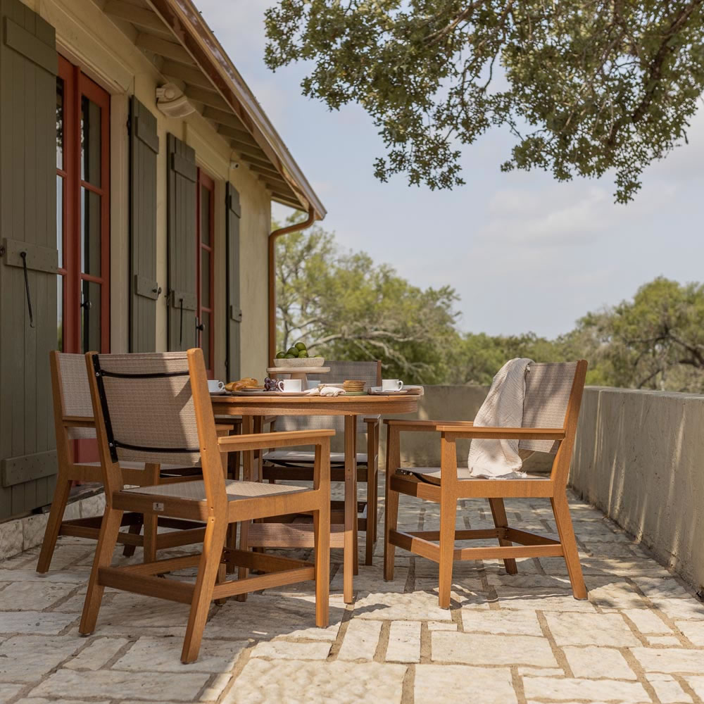 Pictured with the Mayhew Sling Dining Chairs (sold separately)