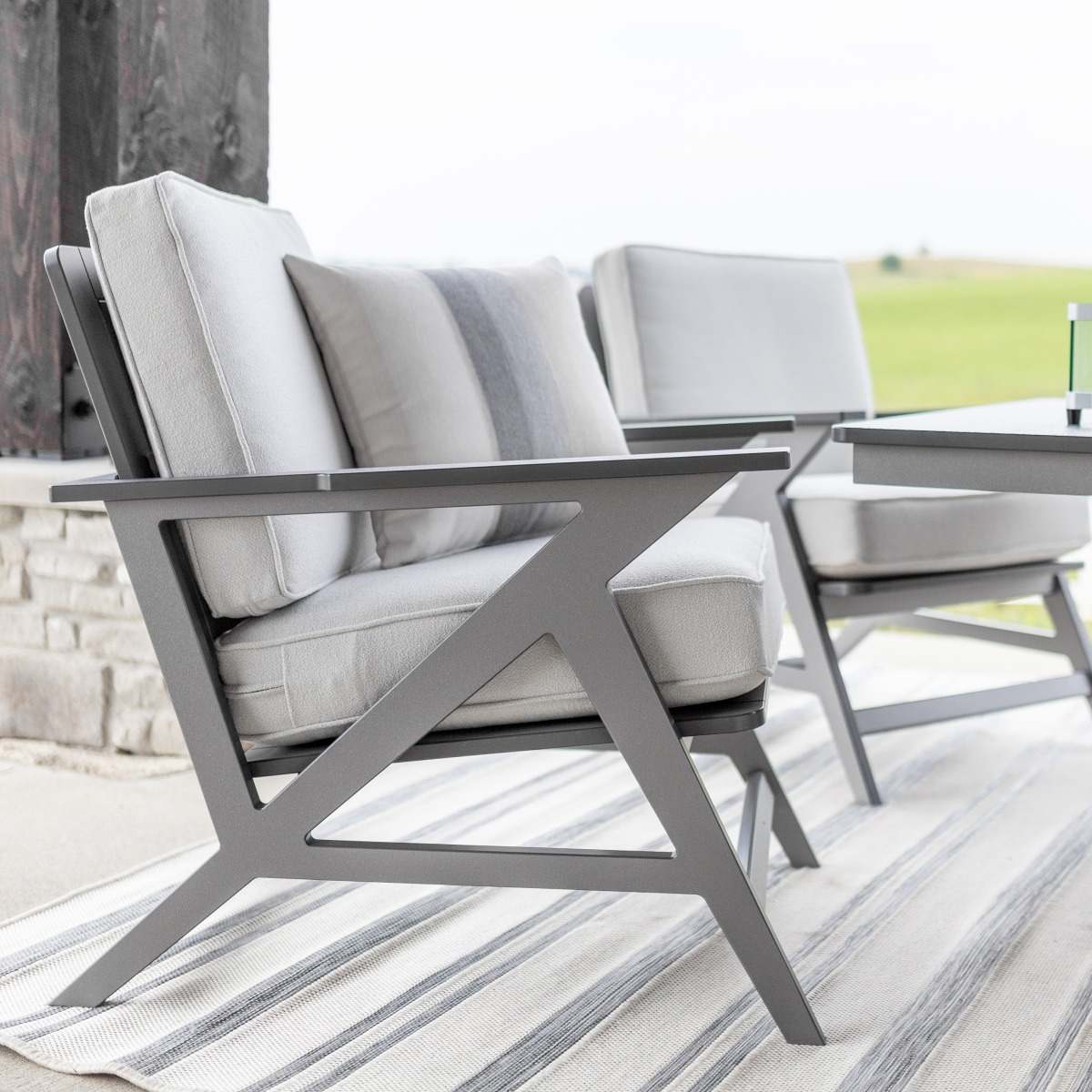 Shown in Graphite Frame with Pizzazz Fog Cushions