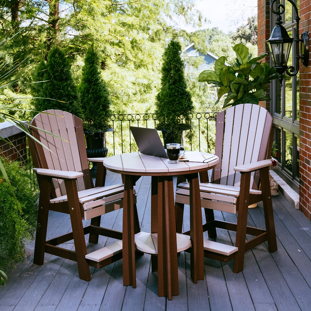 Luxcraft Adirondack Balcony Chair shown in weatherwood on tudor brown.
