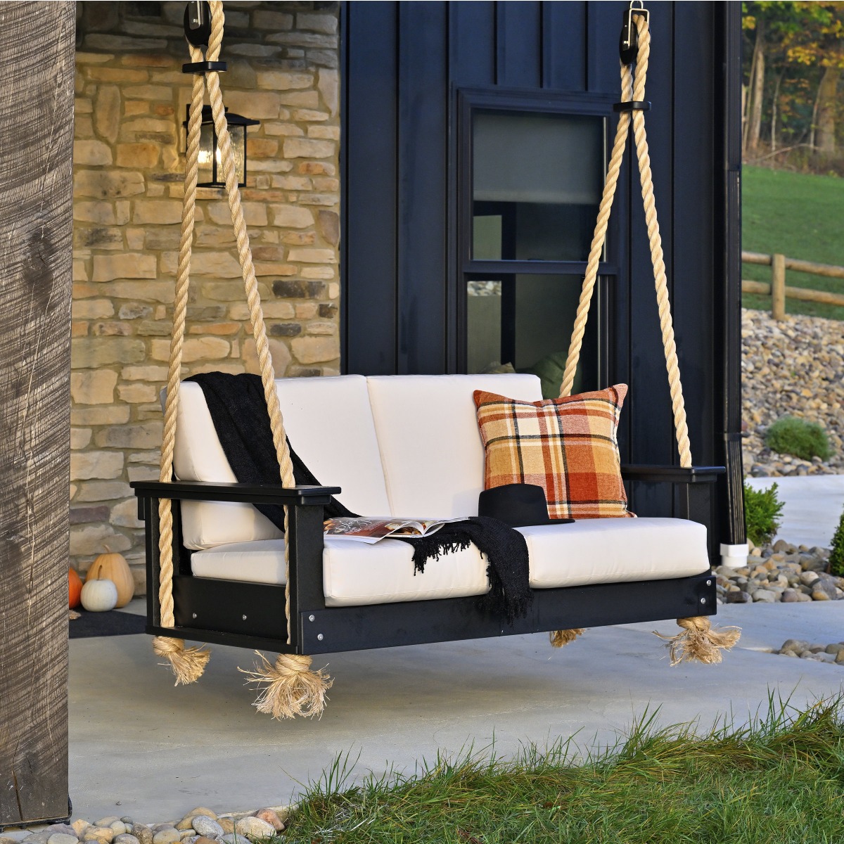 Shown in black frame with canvas cushions.  Throw pillow sold separately